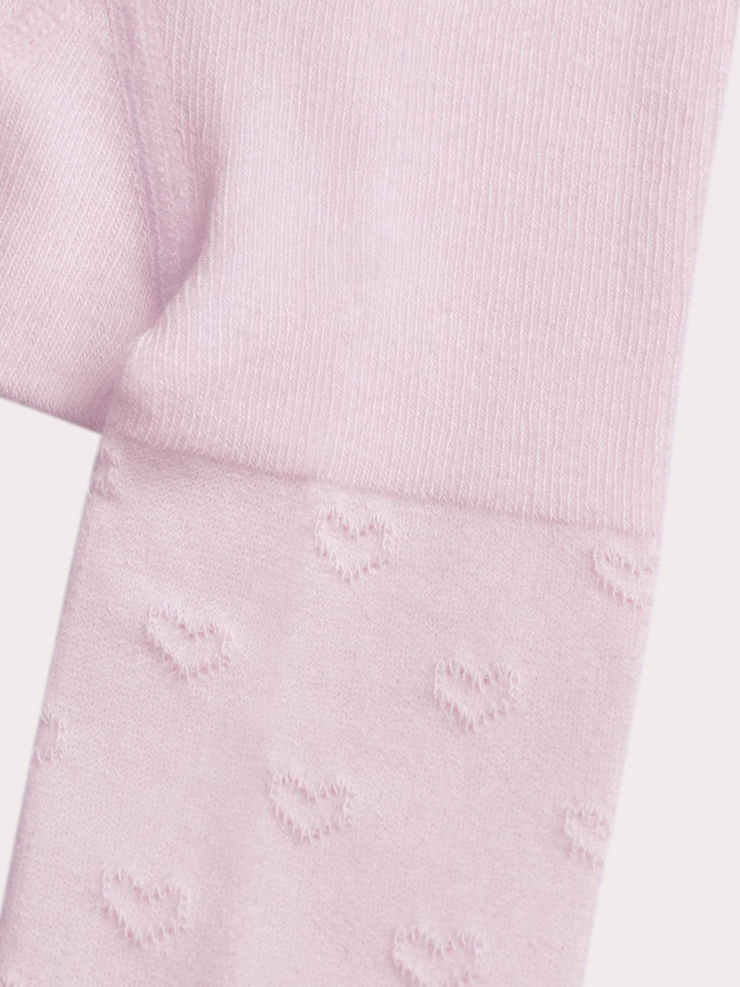 Collant rose à cœurs ajourés pour bébé fille